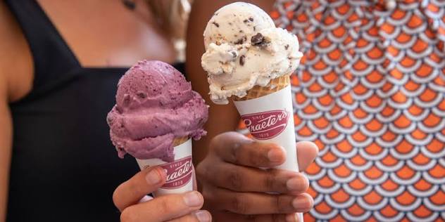 Graeter's Ice Cream cones in hands