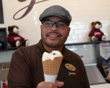 Graeter's Employee Serving Ice Cream Cone
